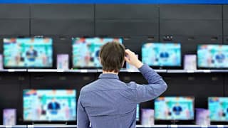man in tv store.width .jpg