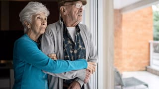 older couple looking out window.jpg