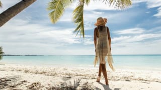 person on tropical beach iGPeBd.width .jpg