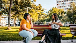 two people on park bench pELhneV.width .jpg