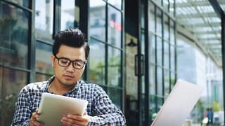 Man reading tablet jNq.width .jpg