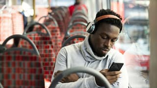 Man riding bus UVEyoyS.width .jpg