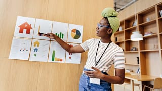 financial literacy teacher at a board.jpg