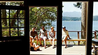 friends on deck of lake house sMCcwwu.width .jpg