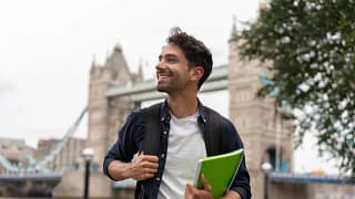 getty happy college student in london study abroad millennial gen z.jpg