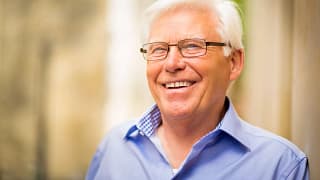 getty person smiling looking outward.jpg