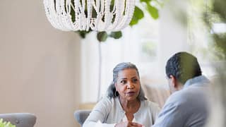 senior couple at table gettyimages .jpg