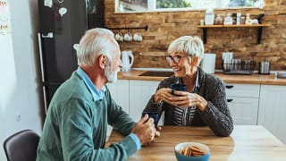 senior couple kitchen table gettyimages .jpg