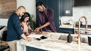 two people with contractor in kitchen OiPYQ.width .jpg