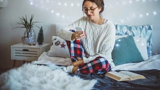 woman on bed on phone.width .jpg