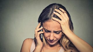 worried on the phone.width .jpg