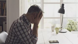 Upset man on phone HIaHrWt.width .jpg