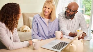 couple consulting with third person.jpg