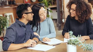 couple negotiating with lender.width .jpg