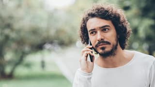 man s s outside phone gettyimages .jpg