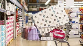 shopping cart full of cleaning products.width .jpg