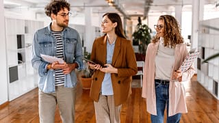 three gen z workers in an office.jpg
