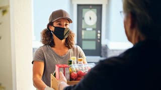 Delivery person drops groceries off GmYwPfu.width .jpg