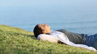 Relaxed woman on hill nEPNCW.width .jpg