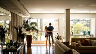 couple at window nice apartment VXdZl.width .jpg