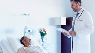 doctor with older male patient gettyimages .jpg