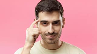 getty finger on forehead head smart move savvy good idea.jpg