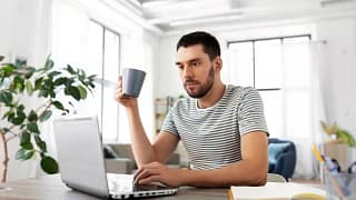 man s s laptop serious gettyimages .jpg