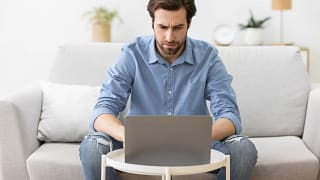 man s laptop serious gettyimages .jpg