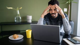 man s stressed laptop gettyimages .jpg
