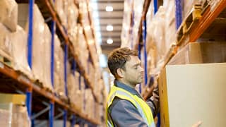 man working in warehouse gettyimages .jpg