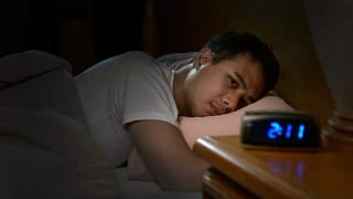 man in bed cant sleep WPiAsg.width .jpg