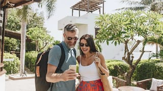 mature man and woman taking a selfie in front.width uADyZo.jpg