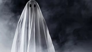 person wearing a sheet as a ghost costume for.width Cjgt.jpg