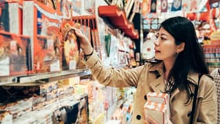 woman buying holiday sweets.width .jpg