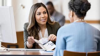 woman opens up new bank account KiaLe.width .jpg