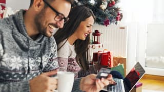 Couple online Christmas shopping.width .jpg