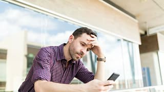 Man upset on phone AOMR.width .jpg