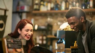 man and woman shopping record store CgcaUNo.width .jpg