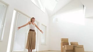 woman and boxes in new home.width .jpg
