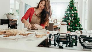 woman baking holiday cookies.width .jpg