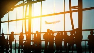 Crowd at an airport pwHBMV.width .jpg
