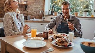 couple eating breakfast at home.width .jpg