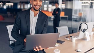 man s smiling professional laptop gettyimages .jpg