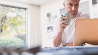 man middle aged at laptop gettyimages .jpg