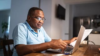 older man at laptop gettyimages .jpg