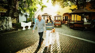 two people walking in courtyard uBaDEe.width .jpg