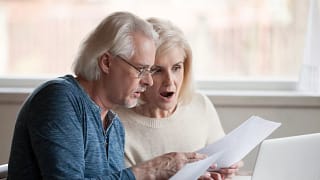getty images older couple shocked by a bill gettyimages.jpg