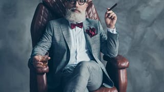getty rich wealthy cigar scotch.jpg