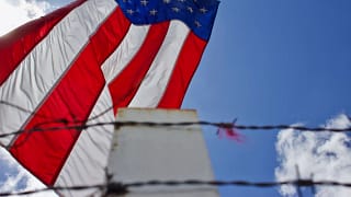 immigration barbed wire fence american flag us worker getty.jpg