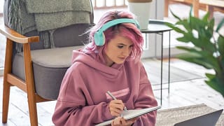 listening learning headphones laptop notes studying.jpg